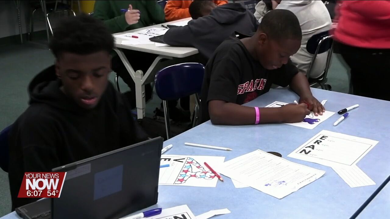 8th graders at Liberty Arts write letters to the veterans going on the Honor Flight